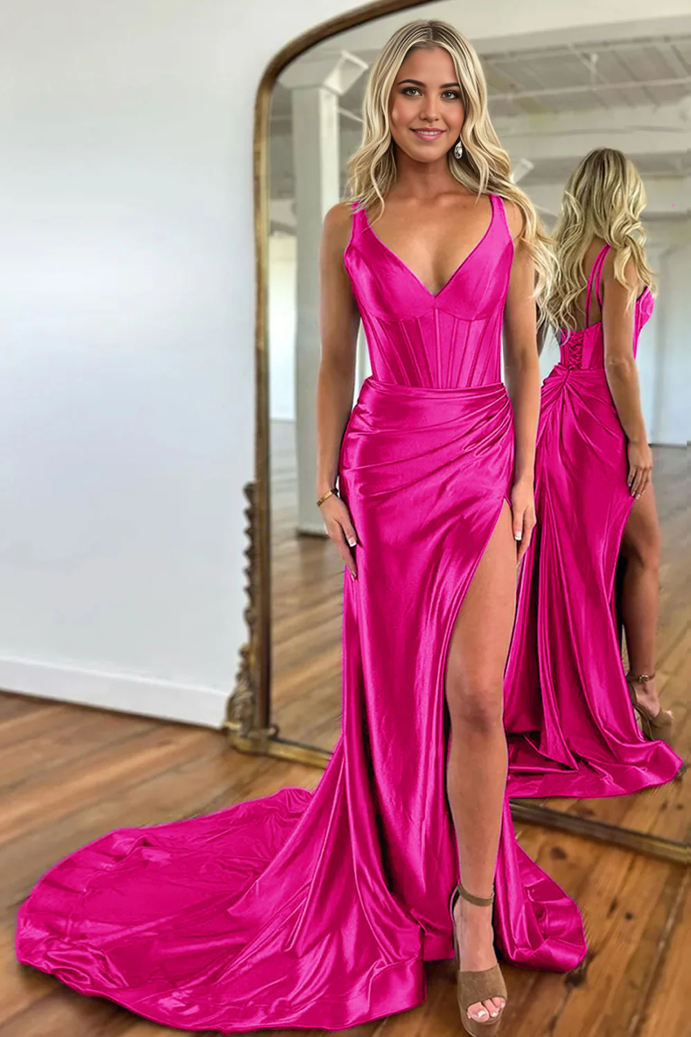 Full length view of the purple mermaid gown with a flowing skirt.