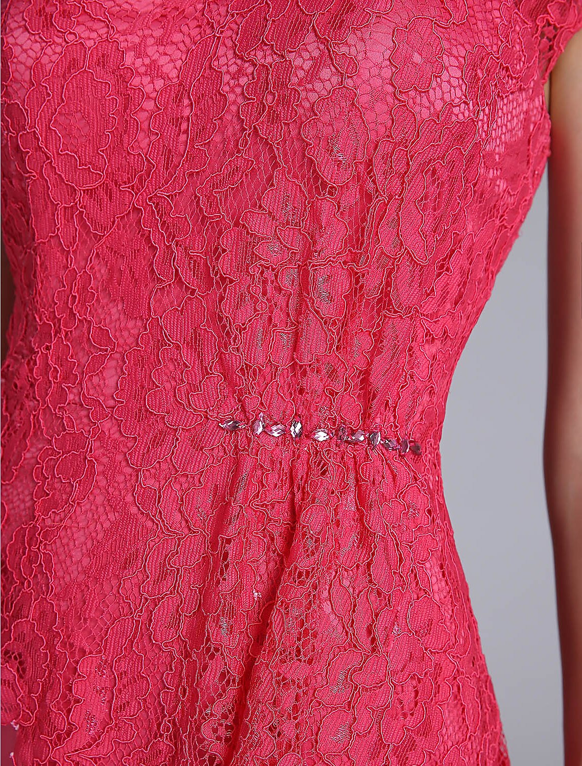 Detail of the lace embellishment on the short sleeves.