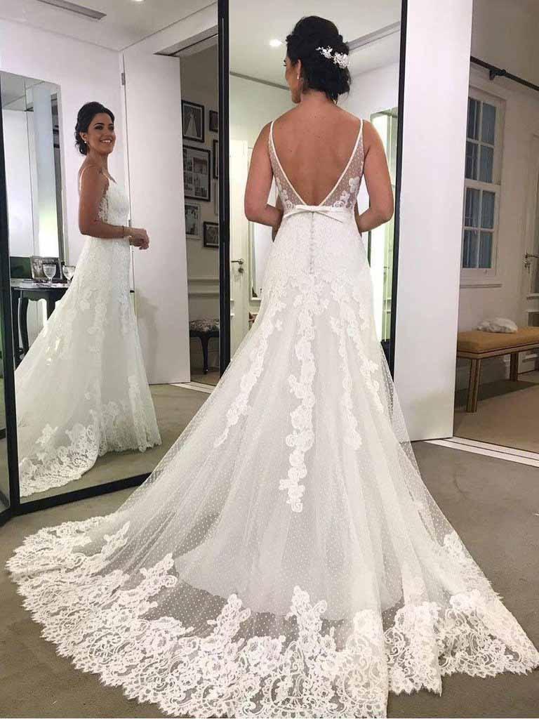 Back view of a Mermaid backless lace wedding dress.