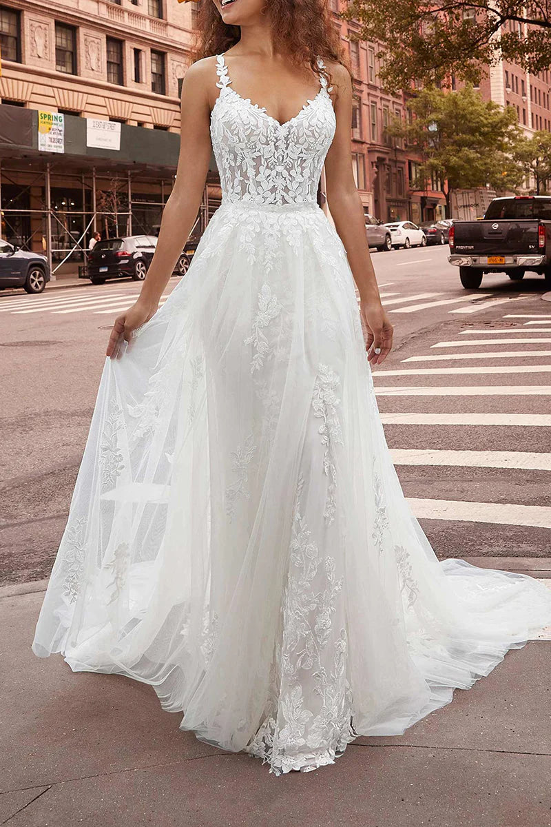 Side view of an elegant mermaid bridal gown.