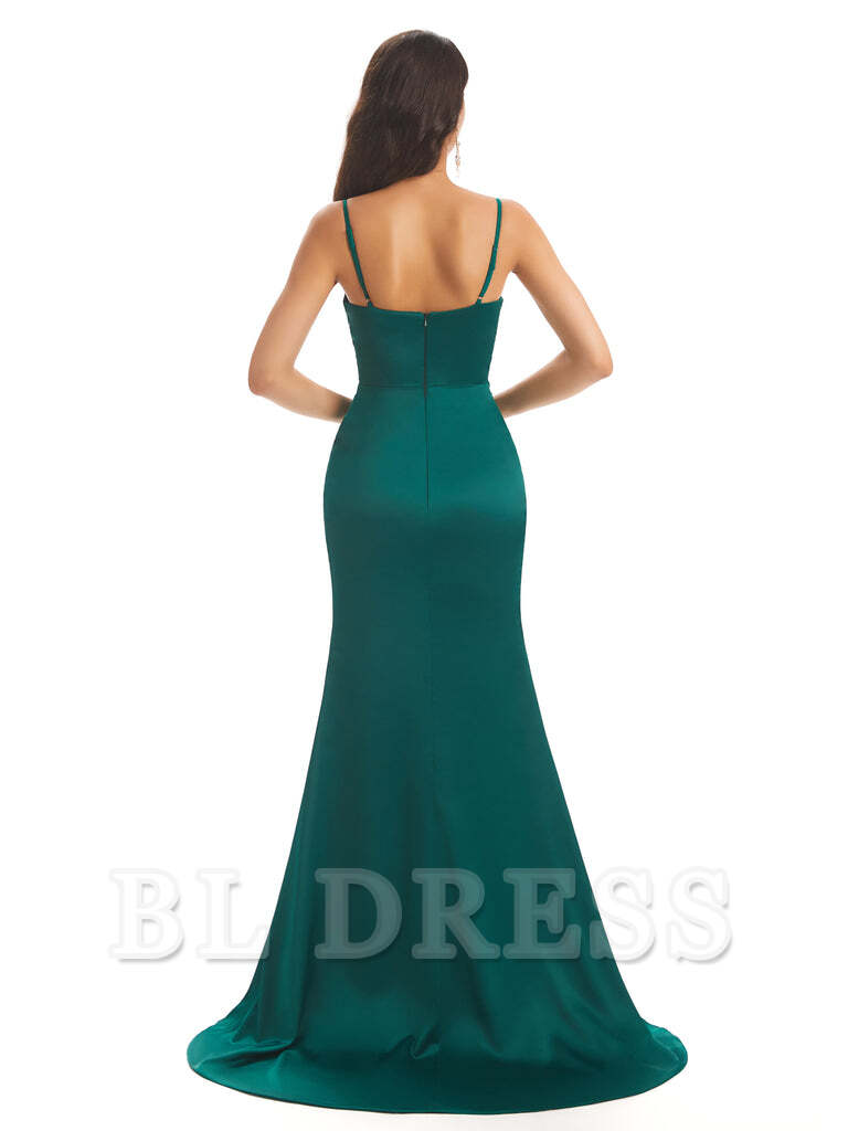 Mermaid satin dress showing a high side slit and flowing skirt.