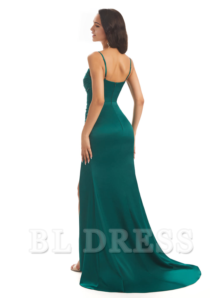 Close-up of the V-neckline and spaghetti straps on the satin dress.