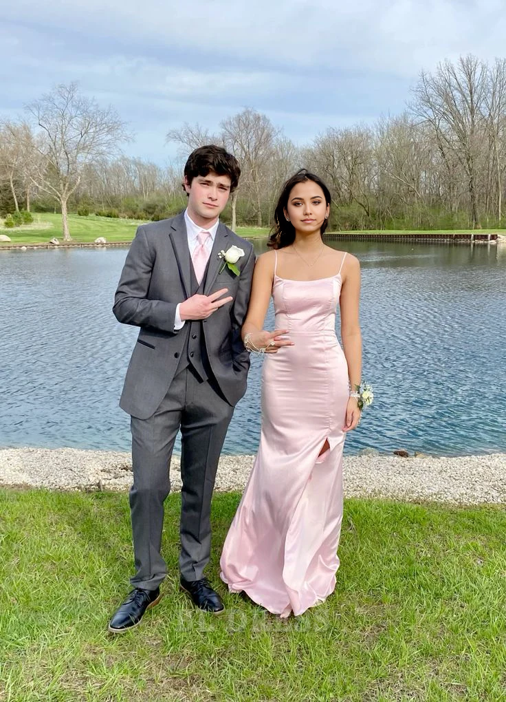 Elegant mermaid gown with spaghetti straps and a high leg split.