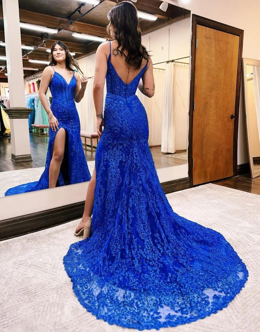 Back view of the mermaid V-neck prom dress with a flowing court train.