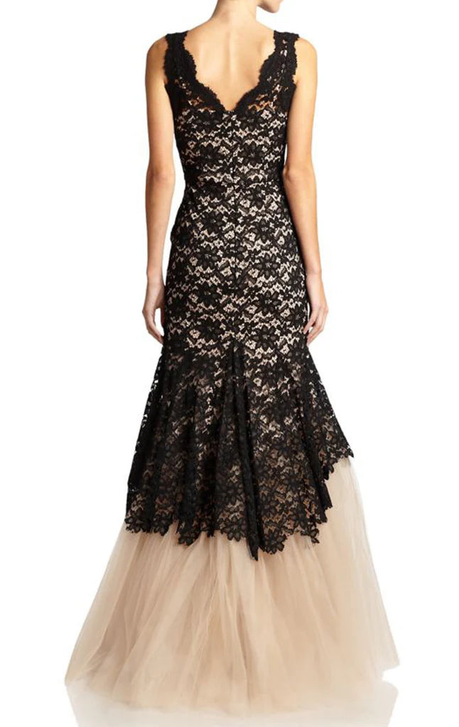 Back view of a mermaid formal gown featuring delicate tulle and spaghetti straps.