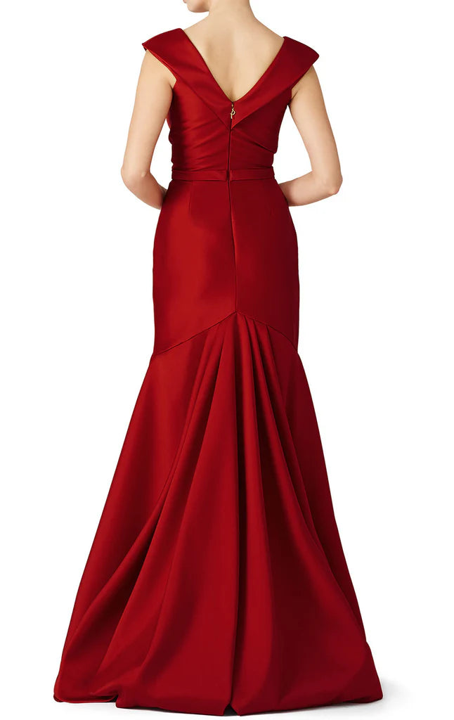 Mermaid satin formal dress with V-neck and spaghetti straps, side view.