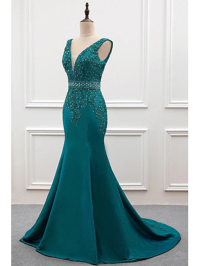 Back view of the mermaid V-neck taffeta evening gown, showcasing the court train and intricate details.