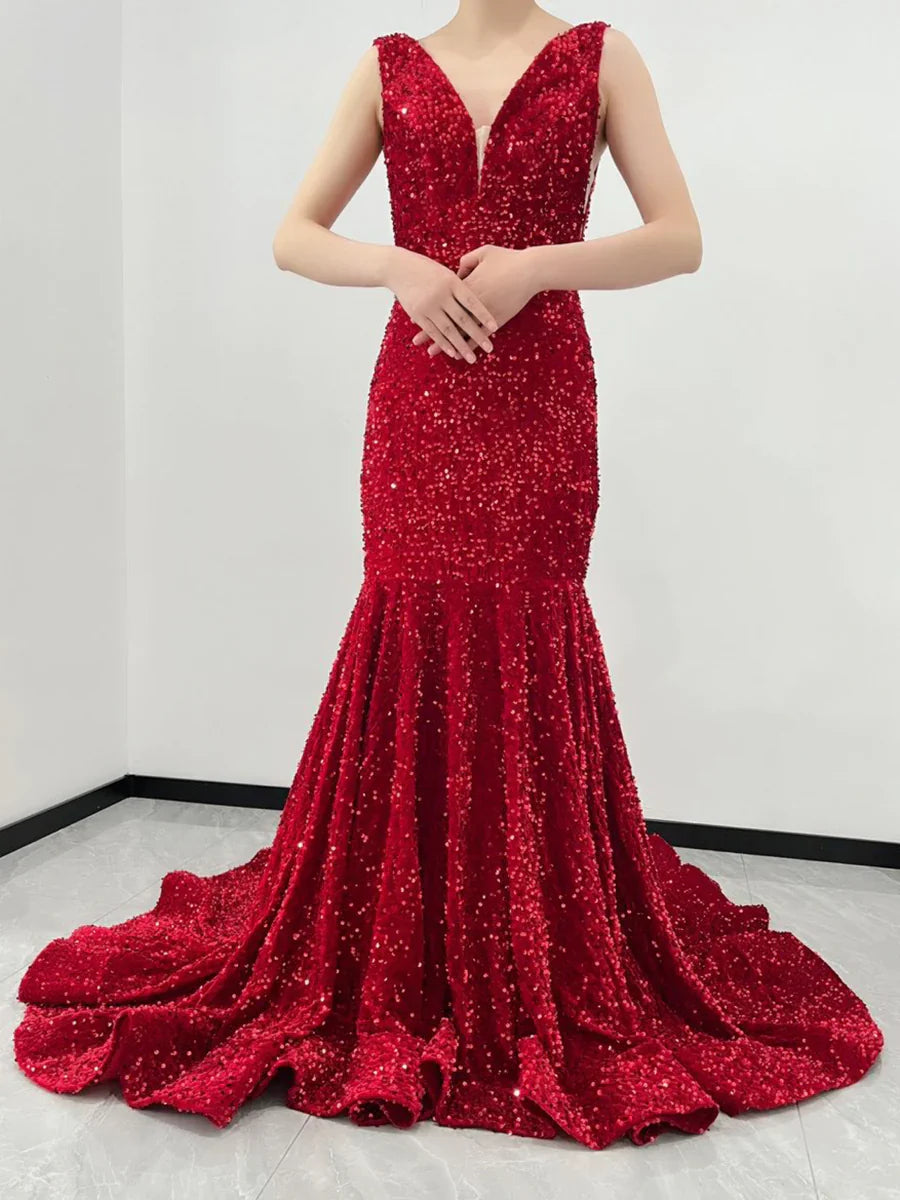 Full view of a red velvet sequin mermaid evening gown.