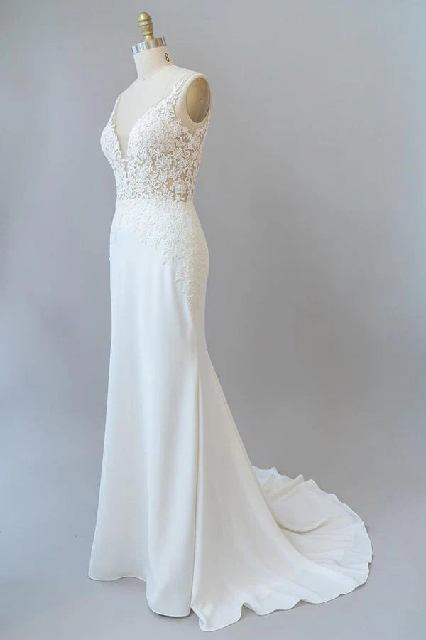 Full length view of the mermaid V-neck bridal gown.