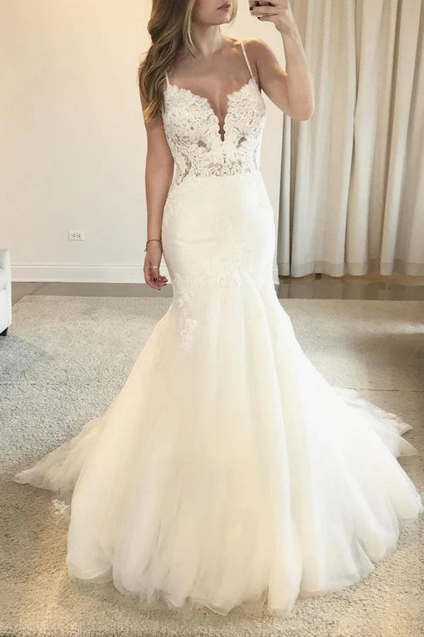 Elegant mermaid V-neck lace wedding dress with spaghetti straps and train.