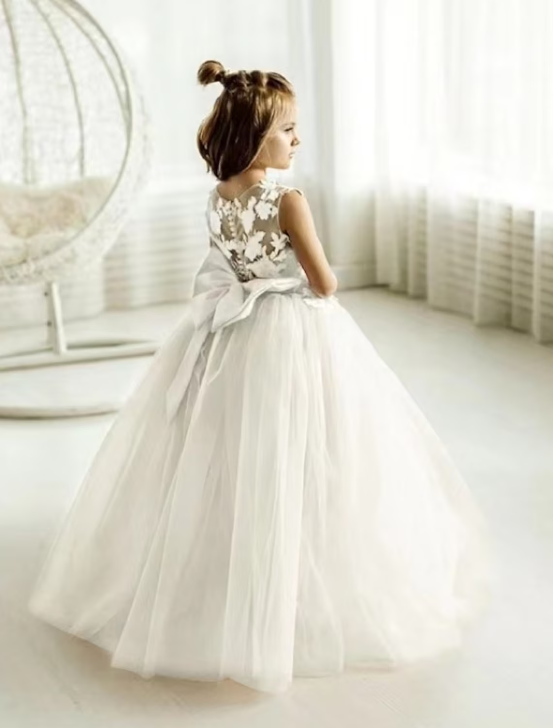 Girl posing in the elegant champagne mid-calf party dress.