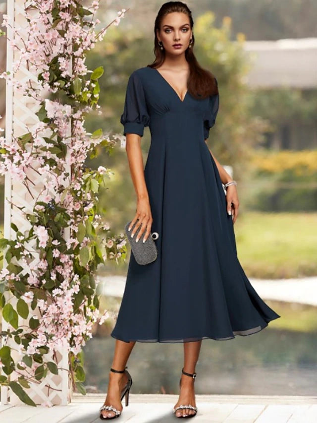 Elegant satin sheath Mother of the Bride dress with V-neck and short sleeves, front view.