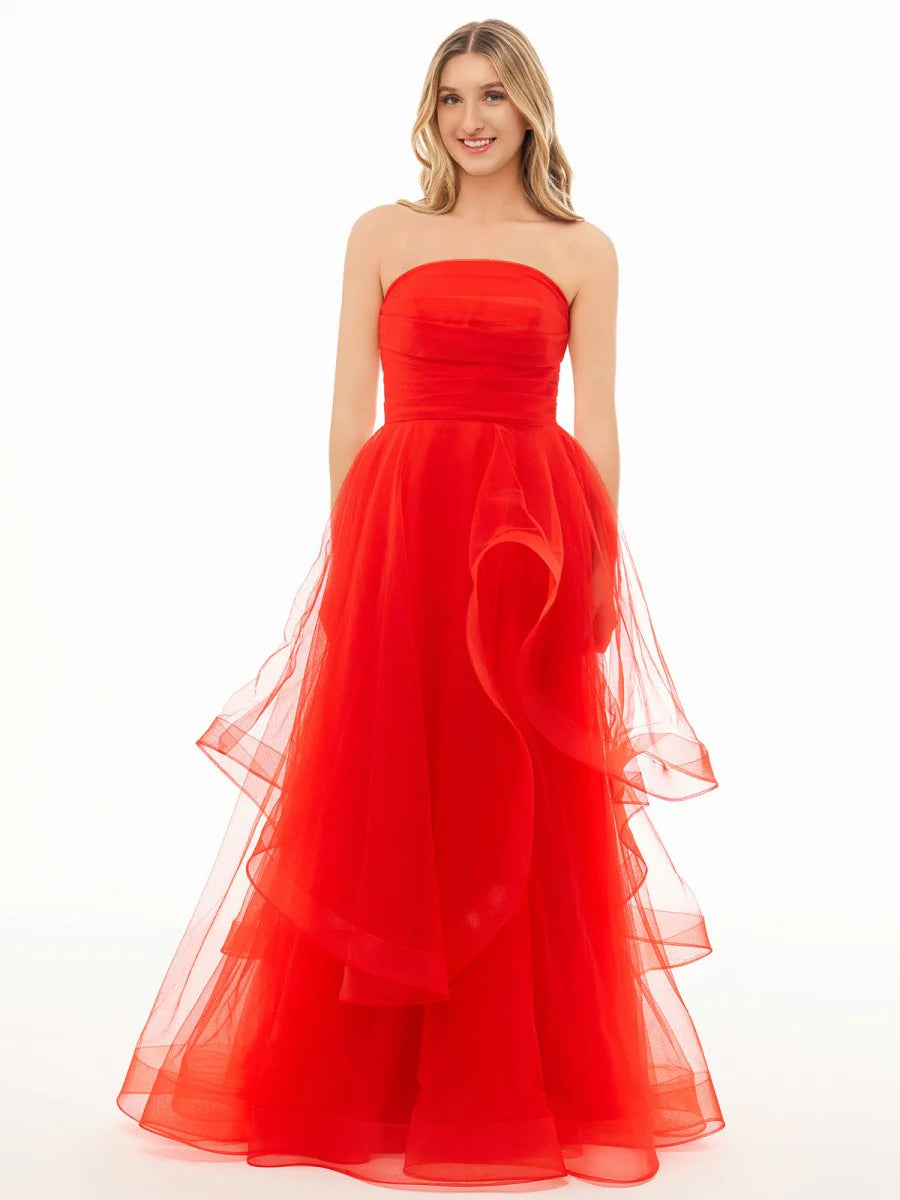 Elegant minimalist strapless ball gown in a studio setting.