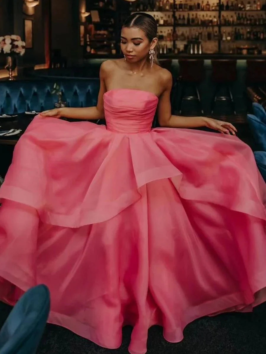 Full length view of the multi-color strapless prom dress.