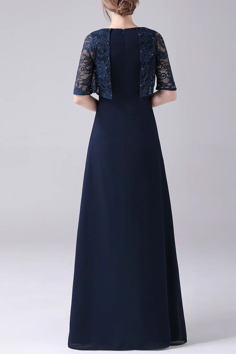 Navy chiffon dress, side view, showing short sleeves.