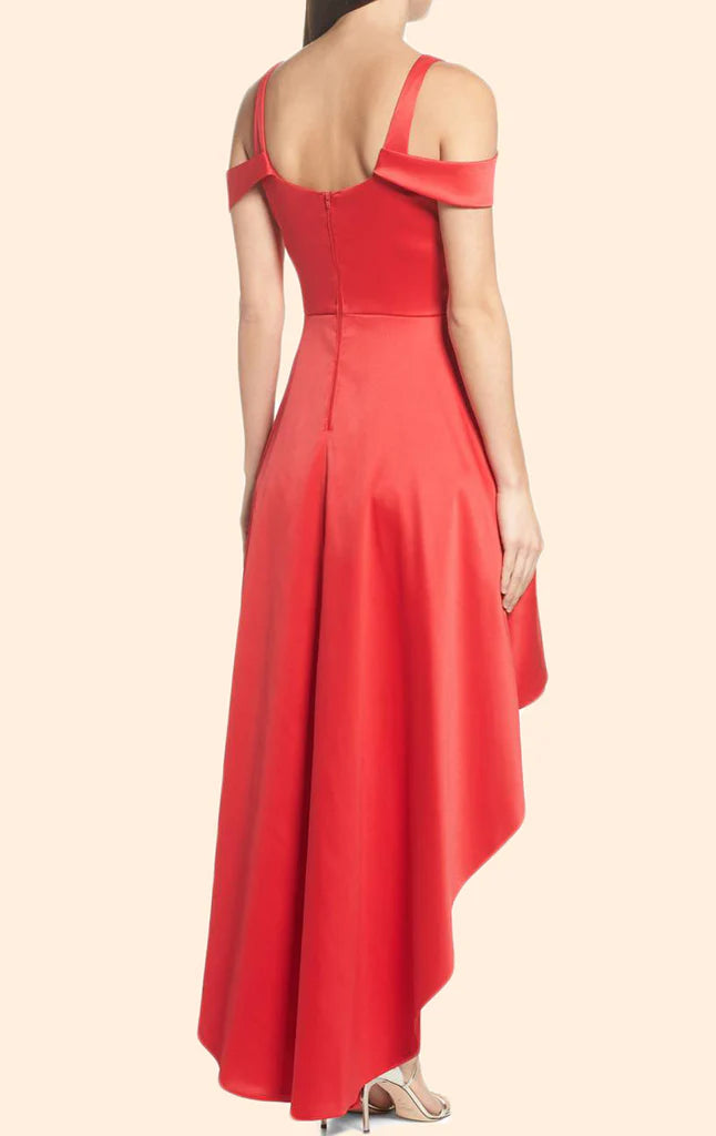 Back view of a woman in a navy blue off-shoulder high-low homecoming dress.