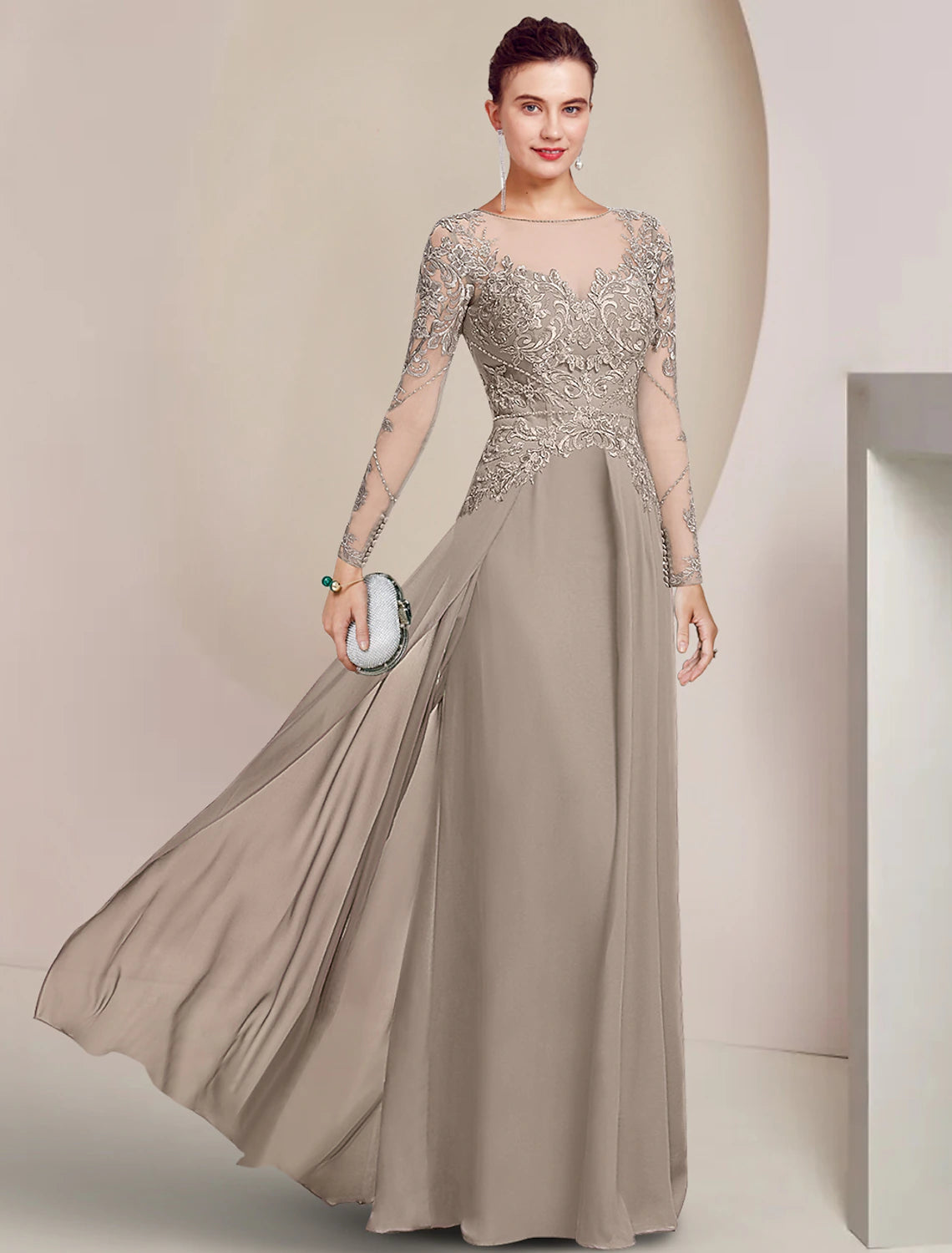 Navy sheath Mother of the Bride dress with scoop neck, long lace sleeves, and beading.
