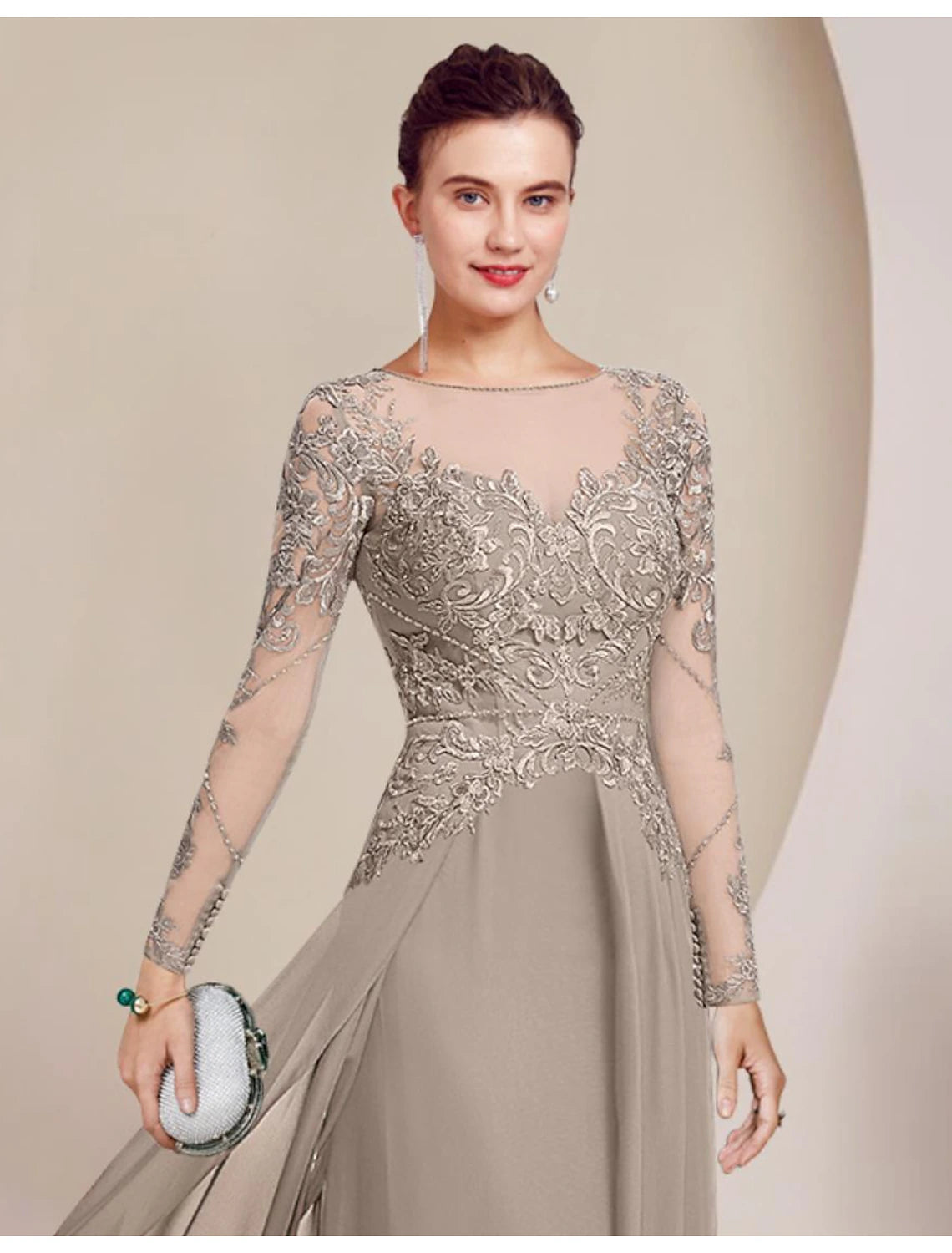 Full length view of elegant navy formal gown, showcasing lace details and floor-length design.