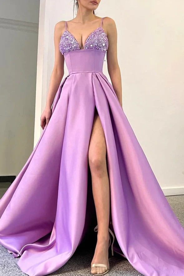 Elegant navy A-line V-neck satin prom dress with delicate bead embellishments.