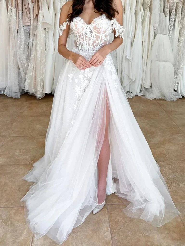 Model wearing an elegant off-shoulder A-line lace wedding dress with a high slit.