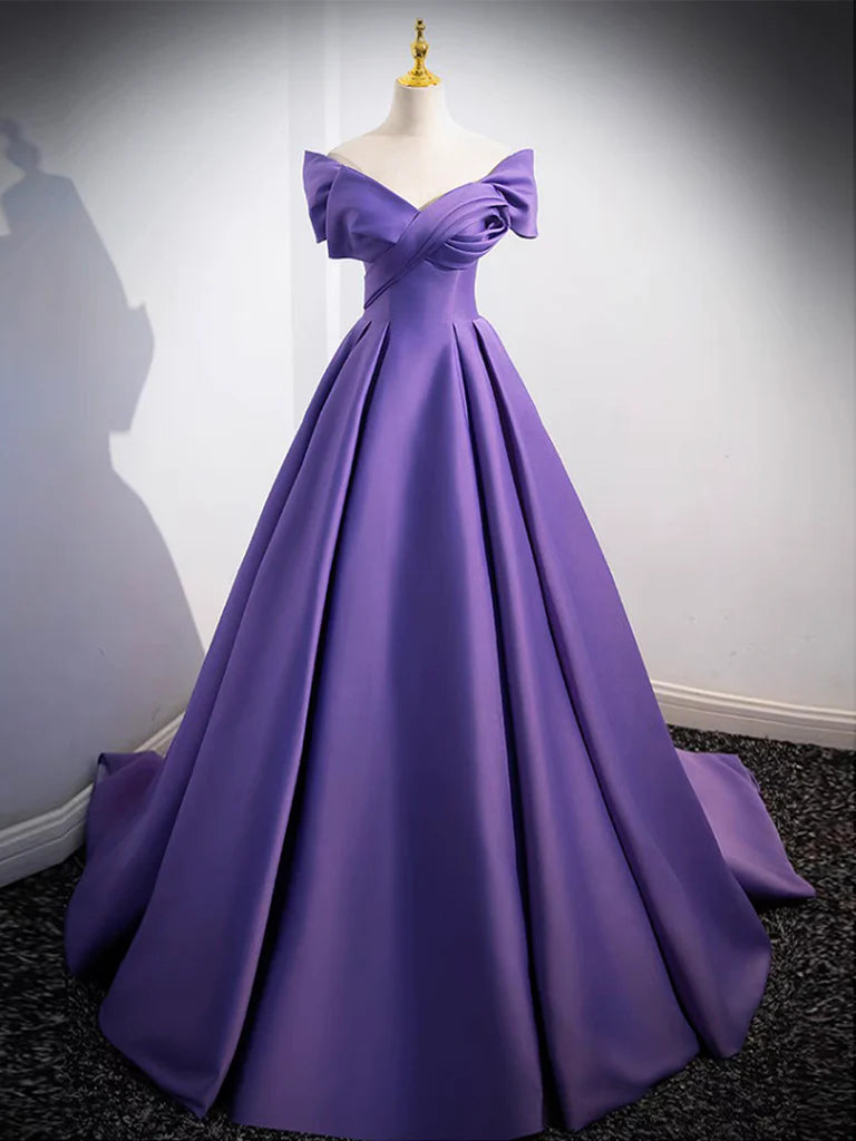 Woman wearing an elegant off-shoulder satin A-line long prom dress.