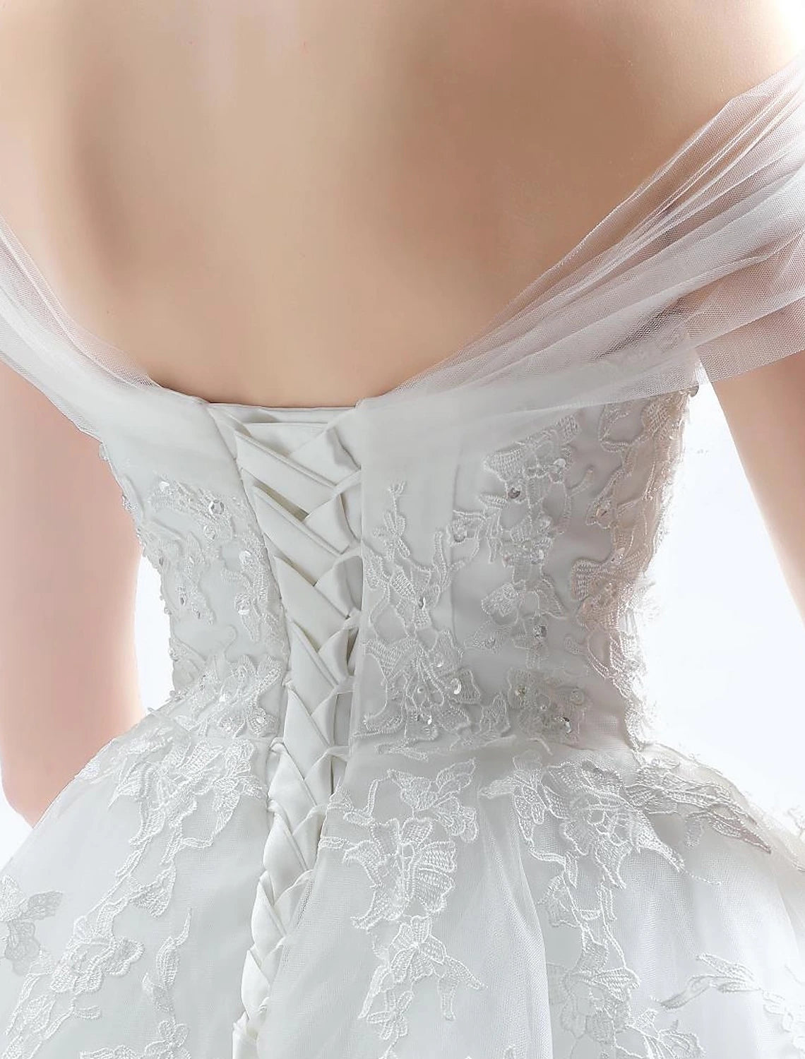 Full length view of the ball gown wedding dress with its flowing cathedral train.