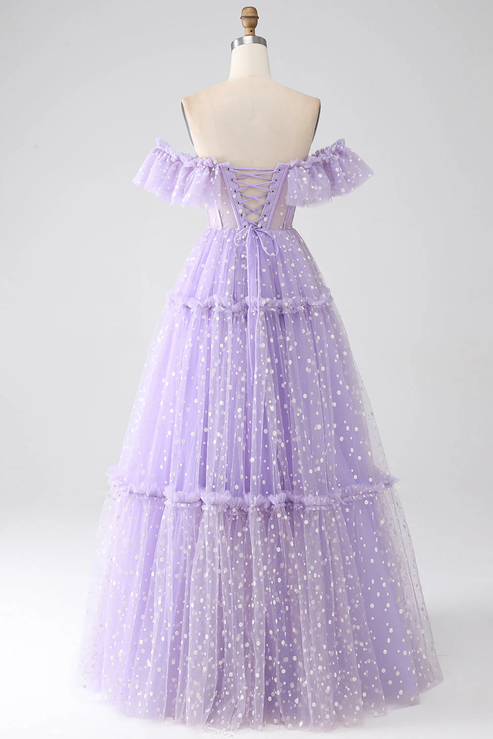 Side view of the lilac off-shoulder corset prom dress.