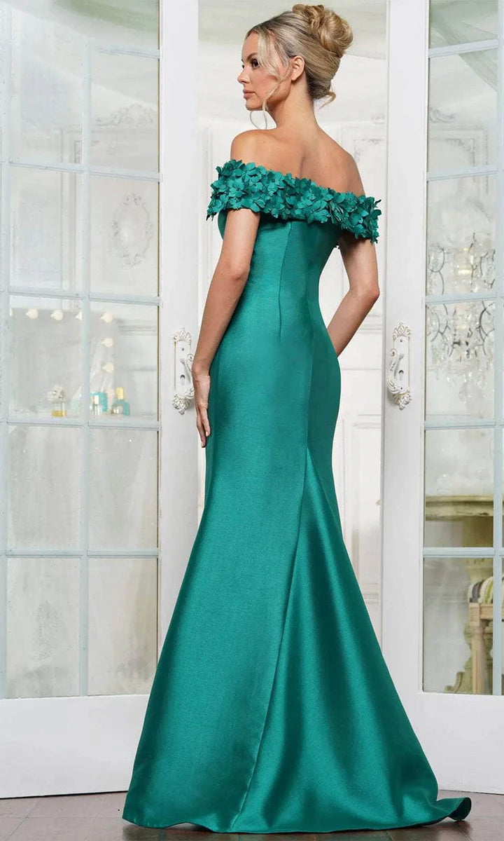 Side view of the off-shoulder floral applique mermaid gown.