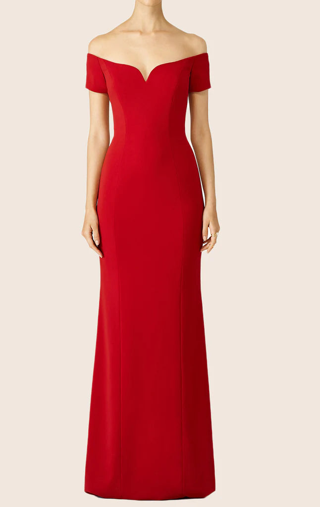 Elegant off-shoulder formal evening gown with a flowing skirt.