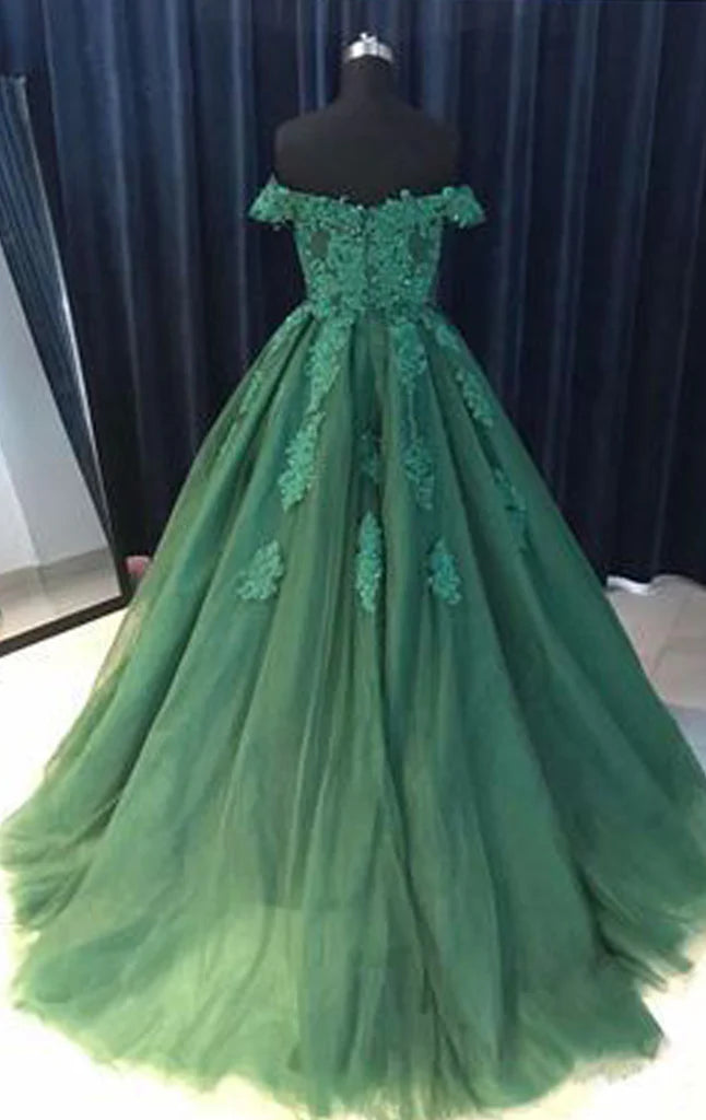 Full view of the off-shoulder lace formal gown on a model.