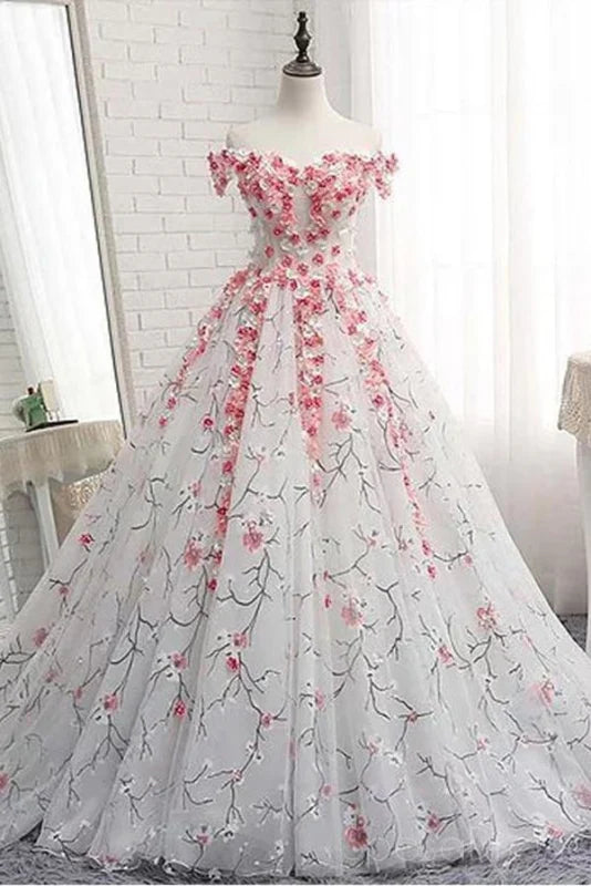 Elegant off-shoulder maxi evening gown with intricate lace applique.