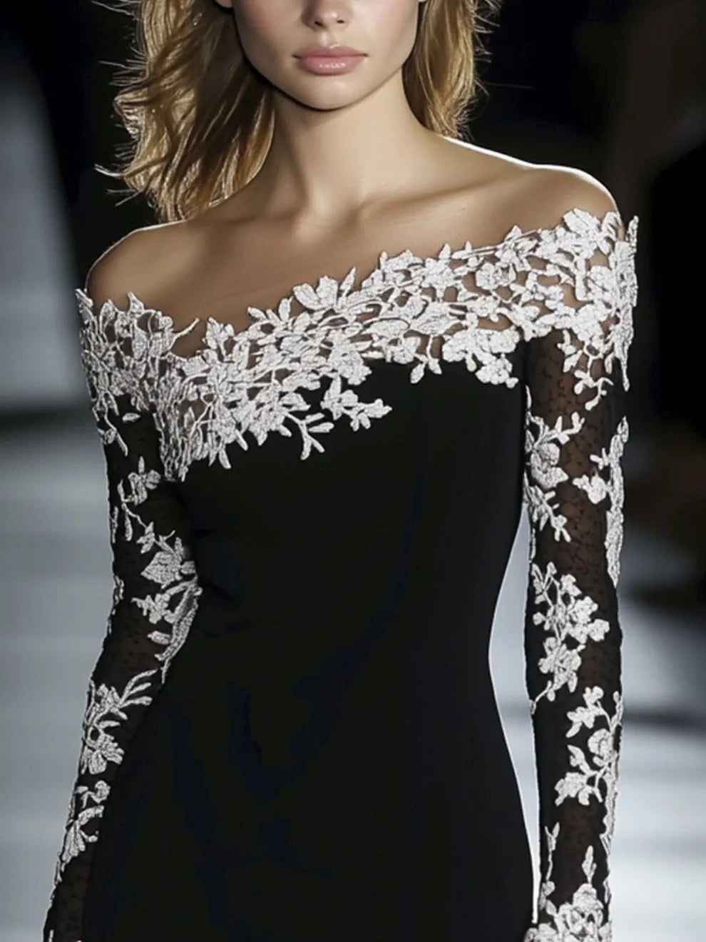 Woman wearing an elegant off-shoulder lace bodycon dress in black, side view.