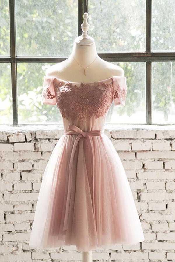 Model wearing a pink off-the-shoulder lace tulle short prom dress.