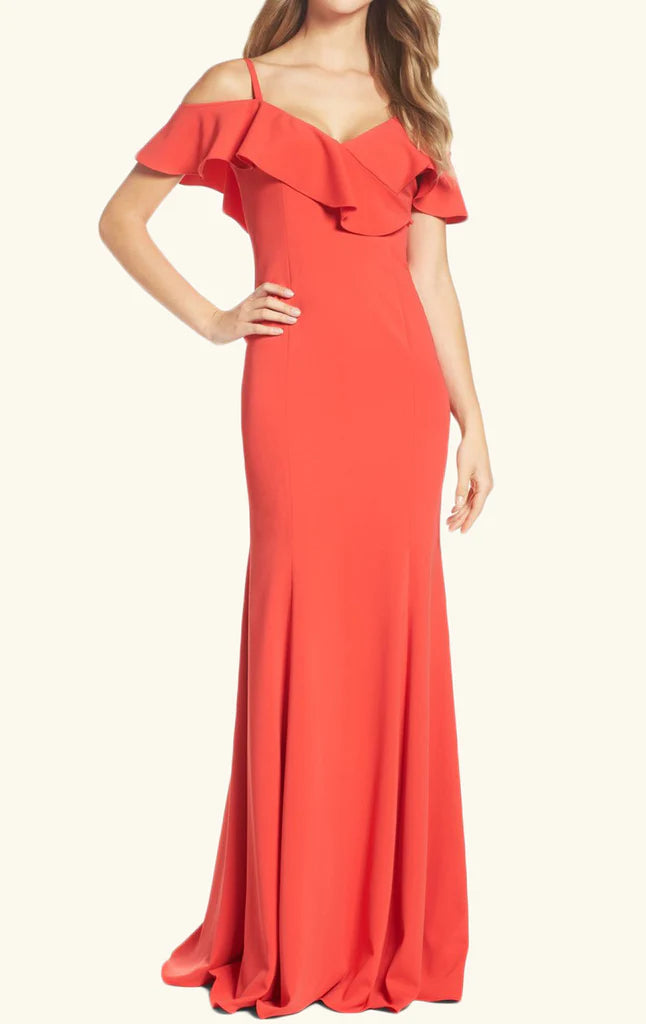 Woman wearing an elegant off-shoulder long prom evening gown.