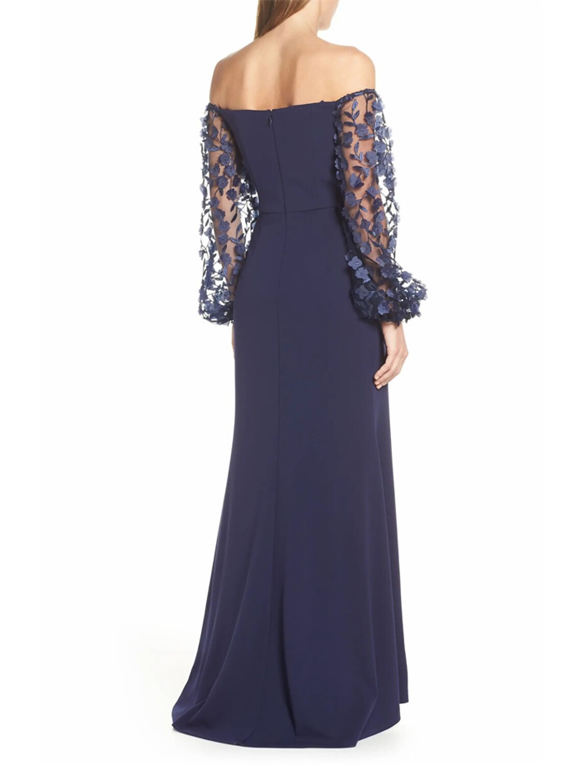 Side profile of an off-shoulder long sleeve evening gown.
