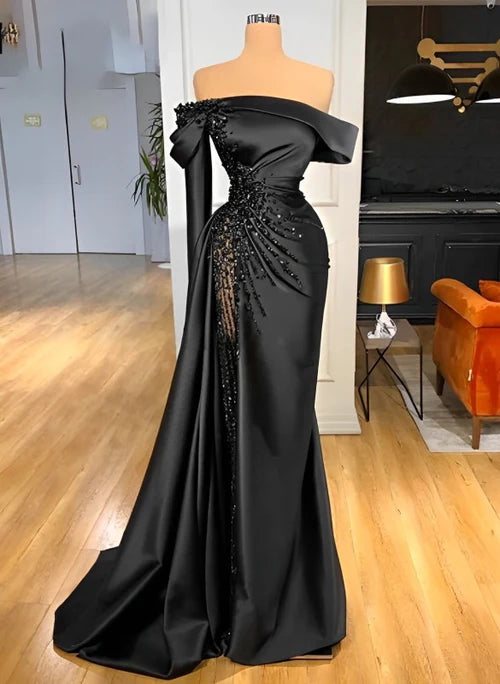 Woman wearing an elegant off-shoulder long sleeves sequined satin wedding dress.