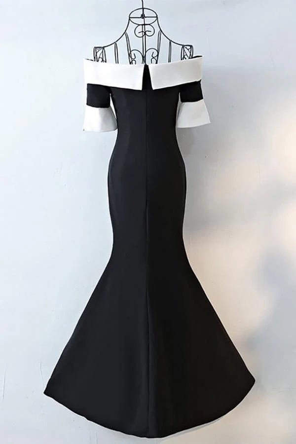 Model wearing a mermaid off-shoulder long formal gown.