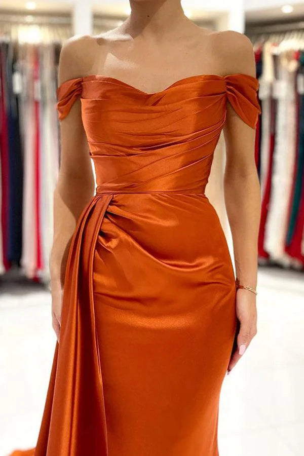 Back view of a mermaid off-shoulder satin evening dress.