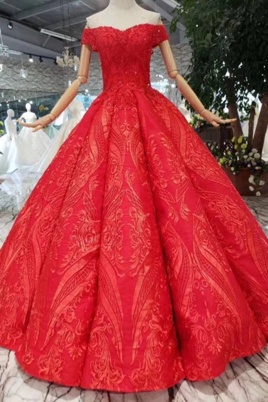 Elegant off-shoulder princess prom gown with lace appliques and beads.