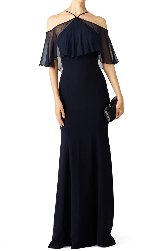 Side view of the off-shoulder formal gown with ruffles.