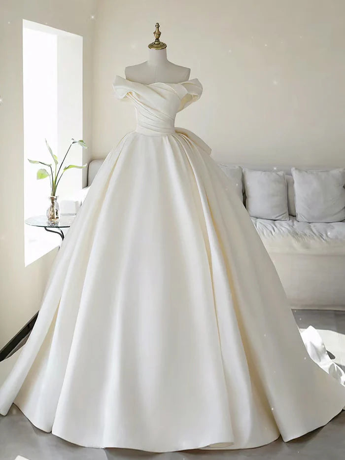 Elegant ivory off-shoulder satin long wedding dress with a flowing A-line skirt.