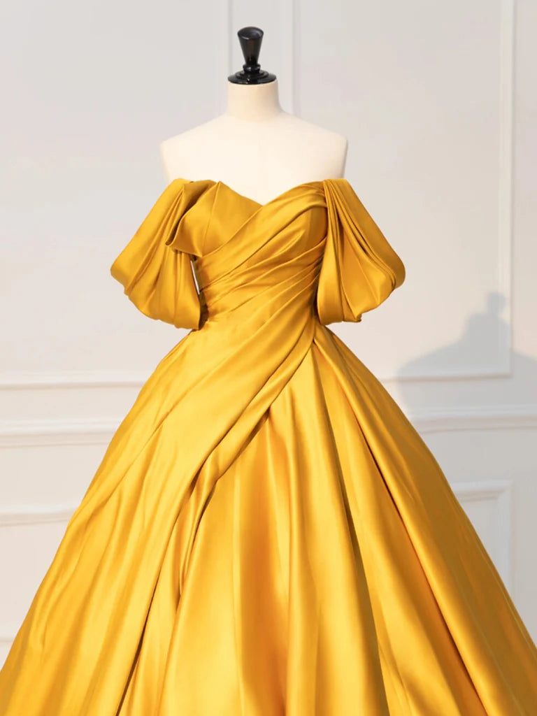 Side view of an elegant off-shoulder blue satin long prom dress.