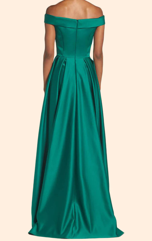 Back view of an off-shoulder satin long prom gown on a model.