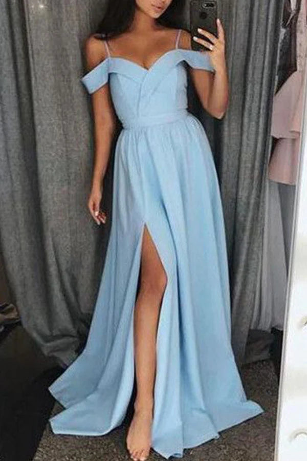 Model wearing an elegant off-shoulder satin maxi prom dress.