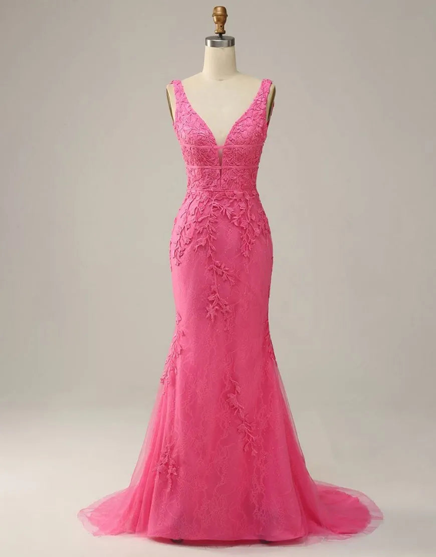 Back view of an off-shoulder sequin prom dress with a flowing skirt.