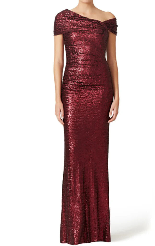 Woman wearing an elegant off-shoulder sequin sheath formal gown.