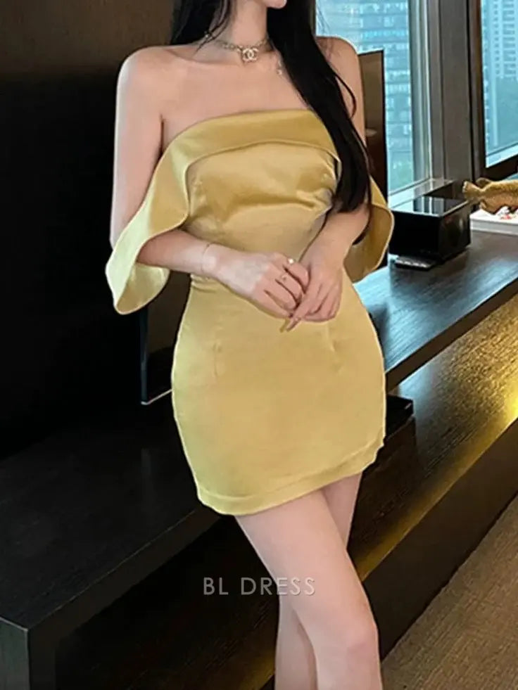 Woman wearing an elegant off-shoulder sheath mini dress.
