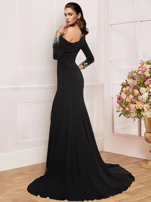 Side profile of the off-shoulder long sleeve dress, highlighting the split front.