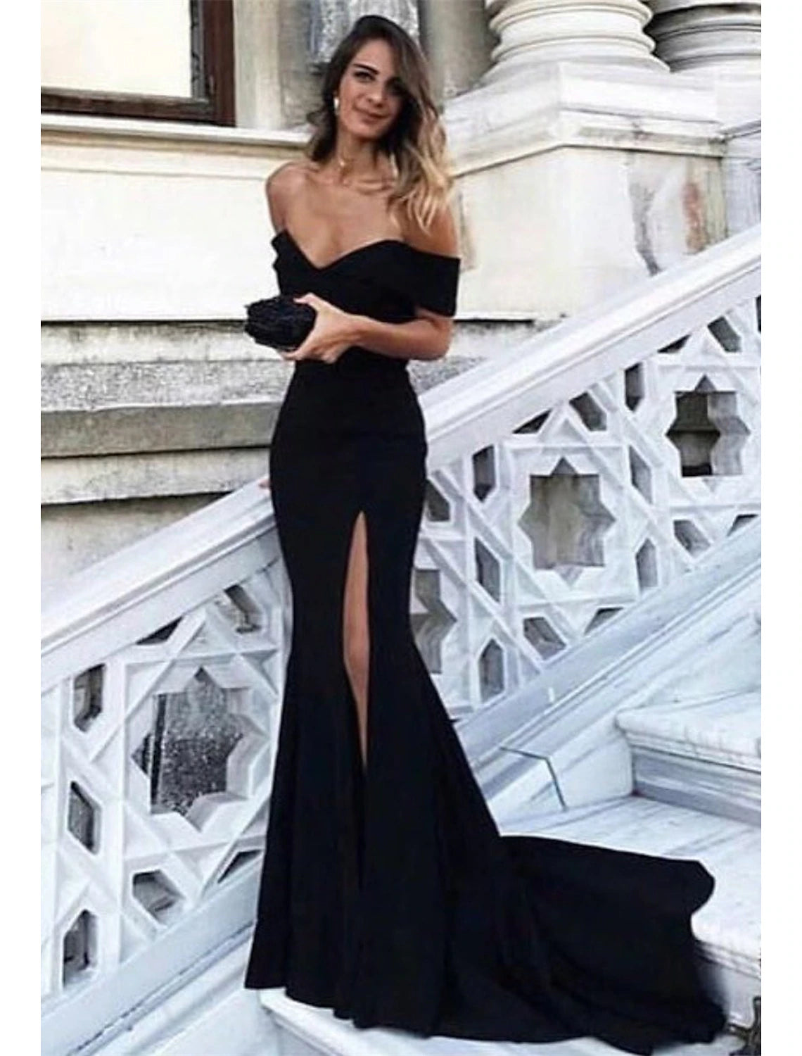 Elegant off-shoulder sheath prom dress with a high slit and court train.