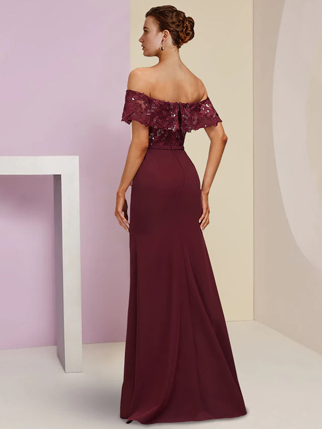Back view of the short sleeve off-shoulder wedding guest dress.